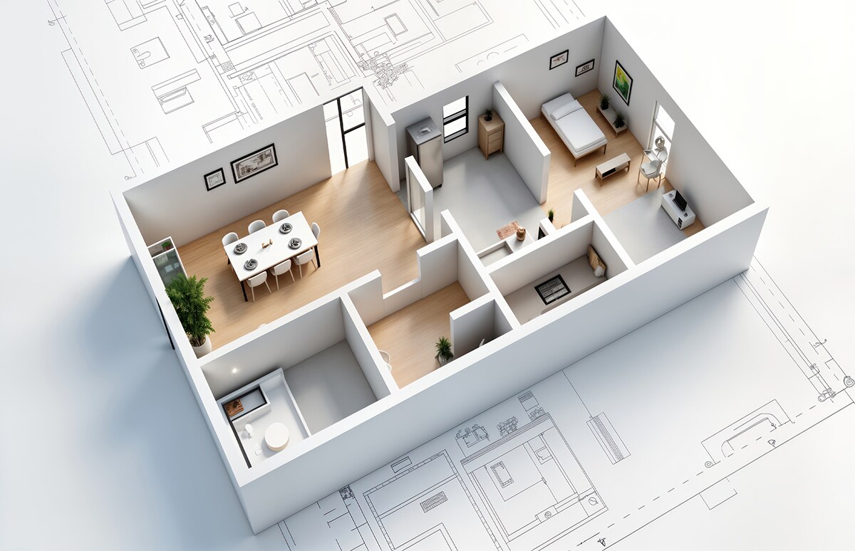 Maqueta de una vivienda sobre los planos de la misma